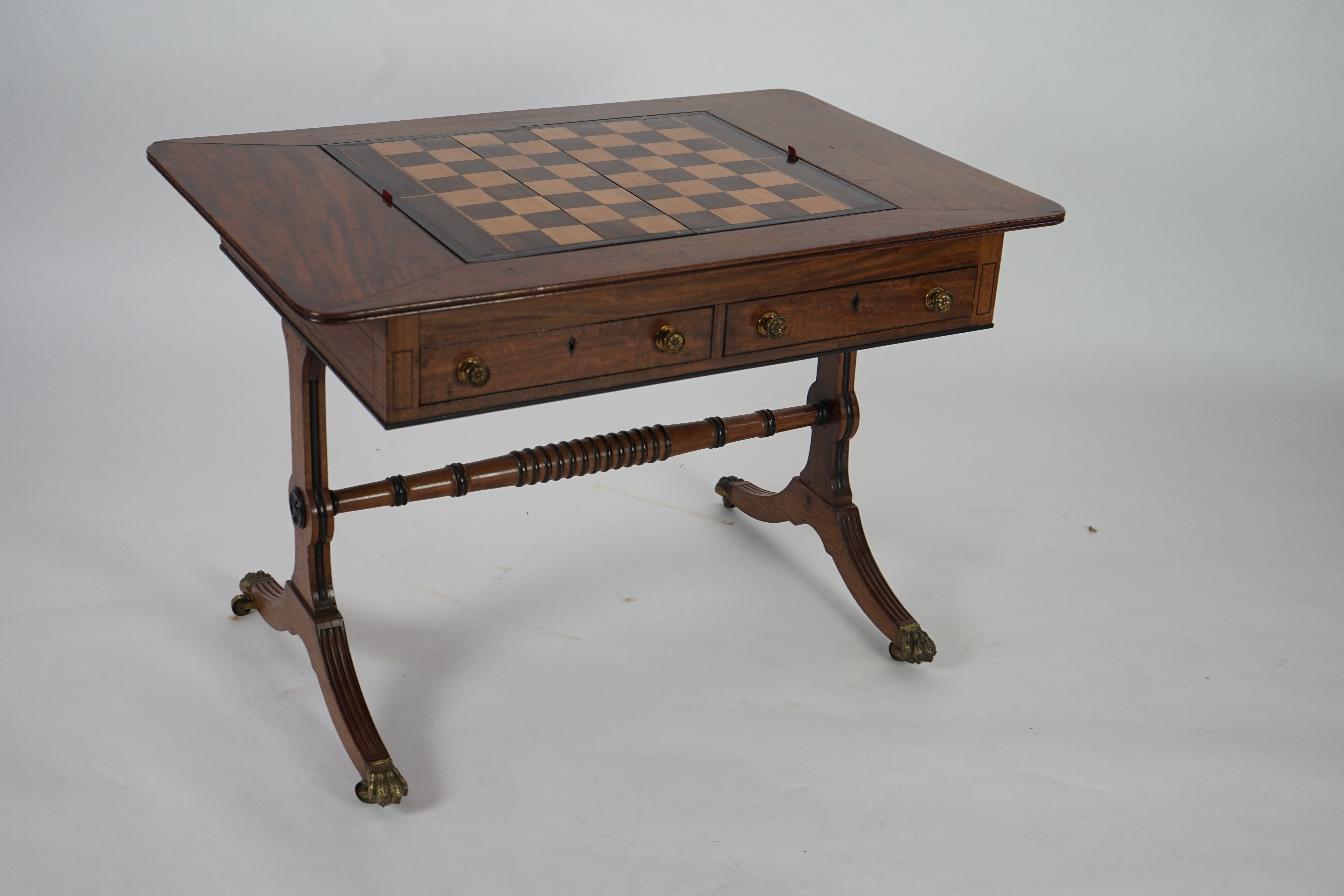 A Regency mahogany games table